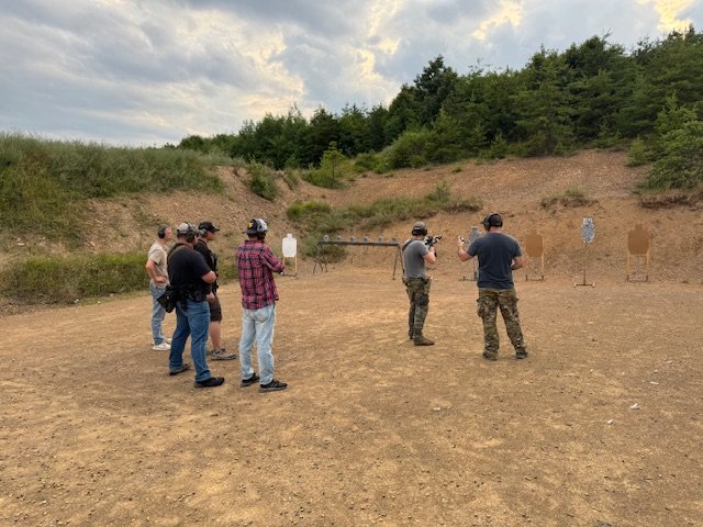 Sphinx team training together at a shooting range